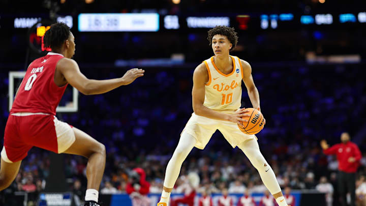 Mar 20, 2026; Philadelphia, PA, USA; Tennessee Volunteers forward Nate Ament (10) looks to pass as Miami (OH) RedHawks forward Eian Elmer (0) defends during the second half during a first round game of the men's 2026 NCAA Tournament at Xfinity Mobile Arena. Mandatory Credit: Bill Streicher-Imagn Images Mar 20, 2026; Philadelphia, PA, USA; Tennessee Volunteers forward Nate Ament (10) looks to pass as Miami (OH) RedHawks forward Eian Elmer (0) defends during the second half during a first round game of the men's 2026 NCAA Tournament at Xfinity Mobile Arena. Mandatory Credit: Bill Streicher-Imagn Images