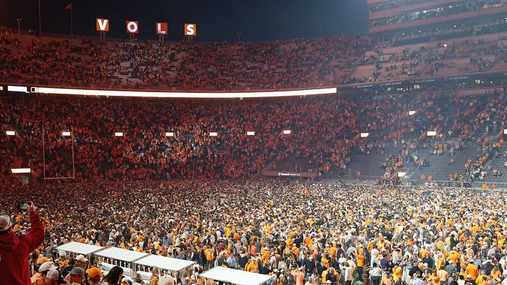 Oct 17, 2026; Knoxville, Tennessee, USA;  Tennessee Volunteers fans celebrate on the field after defeating the Alabama Crimson Tide at Neyland Stadium.  Mandatory Credit: Randy Sartin-Imagn Images