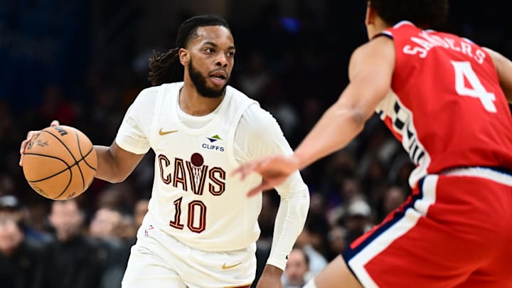 Nov 23, 2025; Cleveland, Ohio, USA; Cleveland Cavaliers guard Darius Garland (10) drives to the basket against Los Angeles Clippers guard Kobe Sanders (4) during the first half at Rocket Arena. Mandatory Credit: Ken Blaze-Imagn Images