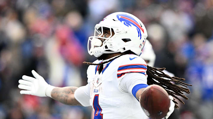 Jan 5, 2025; Foxborough, Massachusetts, USA; Buffalo Bills running back James Cook (4) reacts after scoring a touchdown against the New England Patriots during the second half at Gillette Stadium.