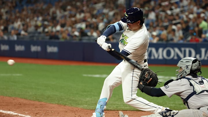 Tampa Bay Rays first base Austin Shenton (54) hits a single against the New York Yankees during the ninth inning at Tropicana Field on May 10.