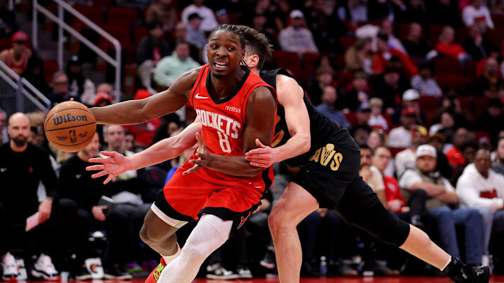 Jan 22, 2025; Houston, Texas, USA; Houston Rockets forward Jae'sean Tate (8) handles the ball against the Cleveland Cavaliers during the fourth quarter at Toyota Center. Mandatory Credit: Erik Williams-Imagn Images