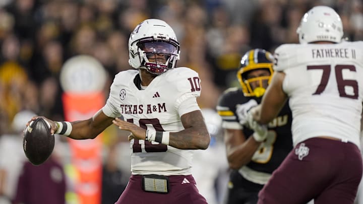 Nov 8, 2025; Columbia, Missouri, USA; Texas A&M Aggies quarterback Marcel Reed (10) throws a pass during the second half against the Missouri Tigers at Faurot Field at Memorial Stadium. Mandatory Credit: Jay Biggerstaff-Imagn Images Nov 8, 2025; Columbia, Missouri, USA; Texas A&M Aggies quarterback Marcel Reed (10) throws a pass during the second half against the Missouri Tigers at Faurot Field at Memorial Stadium. Mandatory Credit: Jay Biggerstaff-Imagn Images