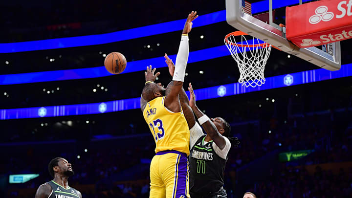 Apr 30, 2025; Los Angeles, California, USA; Minnesota Timberwolves center Naz Reid (11) blocks the shot of Los Angeles Lakers forward LeBron James (23) during the first half in game five of first round for the 2025 NBA Playoffs at Crypto.com Arena. Mandatory Credit: Gary A. Vasquez-Imagn Images Apr 30, 2025; Los Angeles, California, USA; Minnesota Timberwolves center Naz Reid (11) blocks the shot of Los Angeles Lakers forward LeBron James (23) during the first half in game five of first round for the 2025 NBA Playoffs at Crypto.com Arena. Mandatory Credit: Gary A. Vasquez-Imagn Images