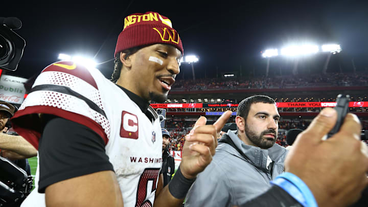 Daniels celebrates by recording a video after the Commanders rallied to beat the Buccaneers on Sunday night.