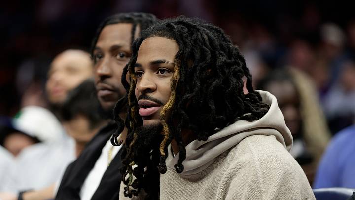 Former Memphis Grizzlies guard Ja Morant watches from the bench in a game against the Charlotte Hornets. Former Memphis Grizzlies guard Ja Morant watches from the bench in a game against the Charlotte Hornets.