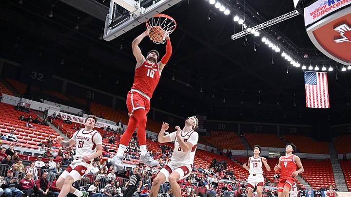 Oct 25, 2025; Pullman, WA, USA; New Mexico Lobos forward Tomislav Buljan (10) dunks the ball in the first half against Washington State at Friel Court at Beasley Coliseum. Oct 25, 2025; Pullman, WA, USA; New Mexico Lobos forward Tomislav Buljan (10) dunks the ball in the first half against Washington State at Friel Court at Beasley Coliseum.