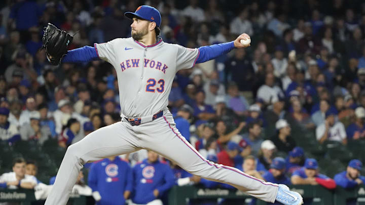 Sep 23, 2025; Chicago, Illinois, USA; New York Mets pitcher David Peterson (23) throws against the Chicago Cubs during the first inning at Wrigley Field. Mandatory Credit: David Banks-Imagn Images