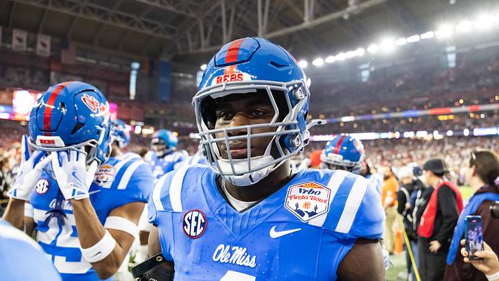 Jan 8, 2026; Glendale, AZ, USA; Mississippi Rebels linebacker Suntarine Perkins (4) against the Miami Hurricanes during the 2026 Fiesta Bowl and semifinal game of the College Football Playoff at State Farm Stadium. Mandatory Credit: Mark J. Rebilas-Imagn Images Jan 8, 2026; Glendale, AZ, USA; Mississippi Rebels linebacker Suntarine Perkins (4) against the Miami Hurricanes during the 2026 Fiesta Bowl and semifinal game of the College Football Playoff at State Farm Stadium. Mandatory Credit: Mark J. Rebilas-Imagn Images