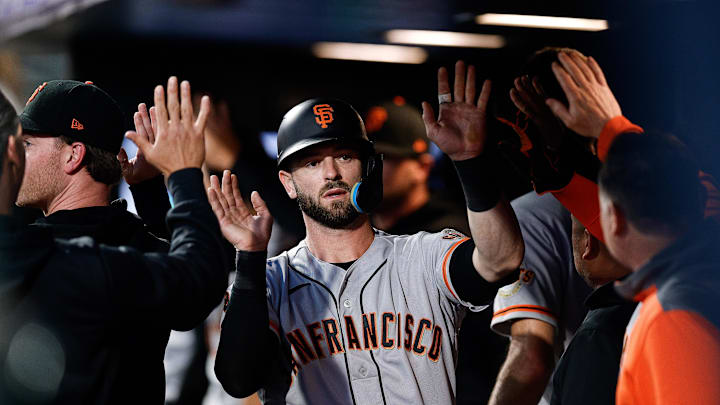 Jun 7, 2023; Denver, Colorado, USA; San Francisco Giants left fielder Mitch Haniger (17) celebrates
