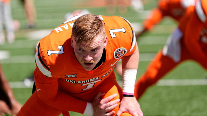 Oklahoma State's Alan Bowman (7) warms up before the college football between the Oklahoma State University Cowboys and the Utah Utes at Boone Pickens Stadium in Stillwater, Okla., Saturday, Sept., 21, 2024. Oklahoma State's Alan Bowman (7) warms up before the college football between the Oklahoma State University Cowboys and the Utah Utes at Boone Pickens Stadium in Stillwater, Okla., Saturday, Sept., 21, 2024.