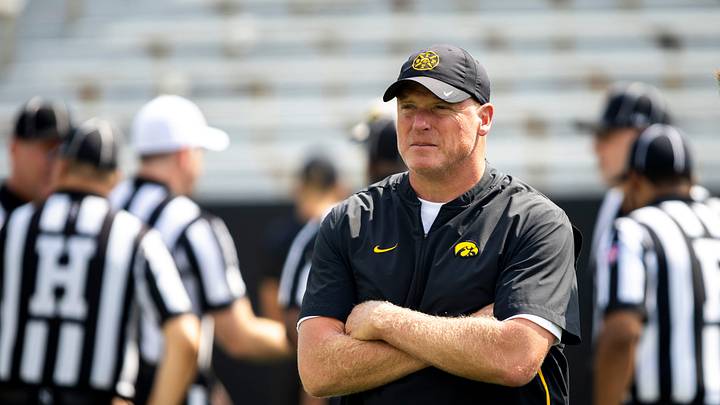 Aug 9, 2025; Iowa offensive line coach George Barnett looks on during the Hawkeyes Kids Day NCAA football open practice at Kinnick Stadium in Iowa City, Iowa. Mandatory Credit: Joseph Cress for the Des Moines Register Aug 9, 2025; Iowa offensive line coach George Barnett looks on during the Hawkeyes Kids Day NCAA football open practice at Kinnick Stadium in Iowa City, Iowa. Mandatory Credit: Joseph Cress for the Des Moines Register