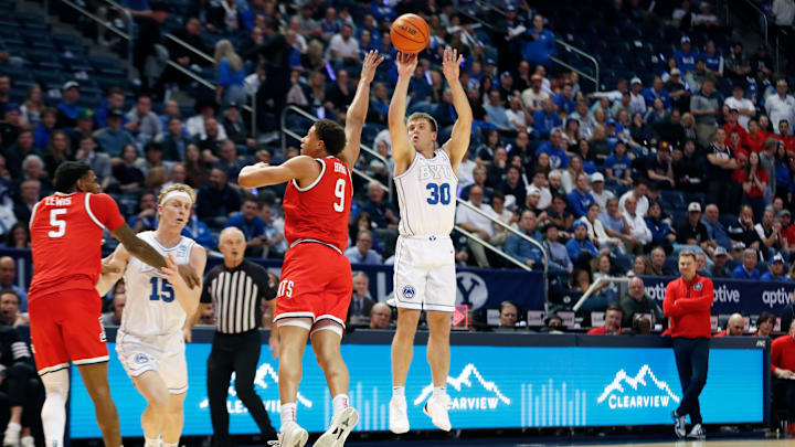 Dallin Hall drills a long shot over Arizona.