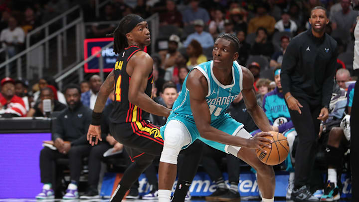 Mar 12, 2025; Atlanta, Georgia, USA; Charlotte Hornets forward Moussa Diabate (14) tries to work past Atlanta Hawks guard Terance Mann (14) during the second half at State Farm Arena. Mandatory Credit: Mady Mertens-Imagn Images Mar 12, 2025; Atlanta, Georgia, USA; Charlotte Hornets forward Moussa Diabate (14) tries to work past Atlanta Hawks guard Terance Mann (14) during the second half at State Farm Arena. Mandatory Credit: Mady Mertens-Imagn Images