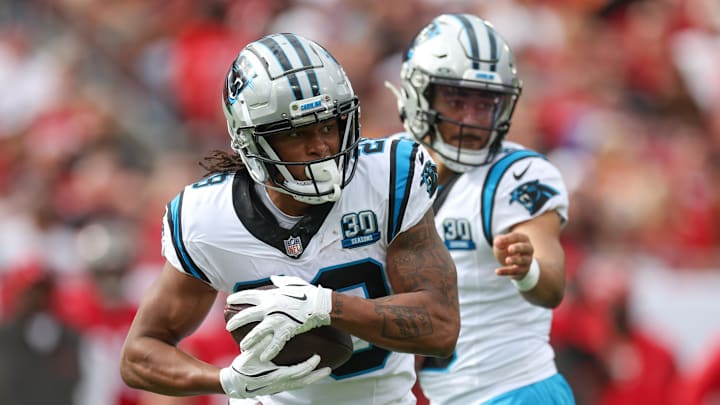 Dec 29, 2024; Tampa, Florida, USA; Carolina Panthers wide receiver Velus Jones Jr. (28) runs with the ball against the Tampa Bay Buccaneers in the second quarter at Raymond James Stadium. Mandatory Credit: Nathan Ray Seebeck-Imagn Images