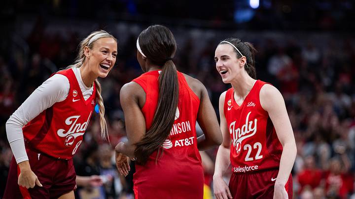May 22, 2026; Indianapolis, Indiana, USA; Indiana Fever guard Caitlin Clark (22) and guard Sophie Cunningham (8) celebrate a made shot with guard Raven Johnson (3) in the second half against the Golden State Valkyries at Gainbridge Fieldhouse. Mandatory Credit: Trevor Ruszkowski-Imagn Images May 22, 2026; Indianapolis, Indiana, USA; Indiana Fever guard Caitlin Clark (22) and guard Sophie Cunningham (8) celebrate a made shot with guard Raven Johnson (3) in the second half against the Golden State Valkyries at Gainbridge Fieldhouse. Mandatory Credit: Trevor Ruszkowski-Imagn Images