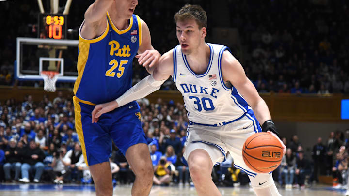 Jan 20, 2024; Durham, North Carolina, USA; Duke Blue Devils center Kyle Filipowski (30) drives to