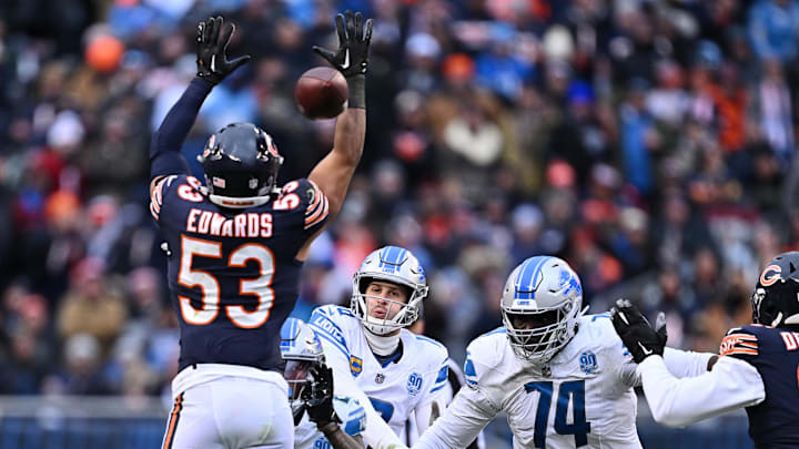 Dec 10, 2023; Chicago, Illinois, USA; Detroit Lions quarterback Jared Goff (16) throws through the defense of Chicago Bears linebacker T.J. Edwards (53) in the second half at Soldier Field. Mandatory Credit: Jamie Sabau-USA TODAY Sports