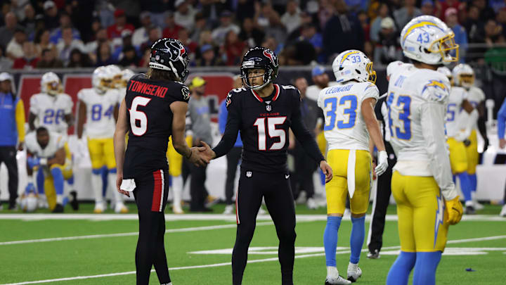 Jan 11, 2025; Houston, Texas, USA; Houston Texans punter Ka'imi Fairbairn (15) celebrates a field goal with punter Tommy Townsend (6) against the Los Angeles Chargers in the third quarter in an AFC wild card game at NRG Stadium. Mandatory Credit: Thomas Shea-Imagn Images Jan 11, 2025; Houston, Texas, USA; Houston Texans punter Ka'imi Fairbairn (15) celebrates a field goal with punter Tommy Townsend (6) against the Los Angeles Chargers in the third quarter in an AFC wild card game at NRG Stadium. Mandatory Credit: Thomas Shea-Imagn Images