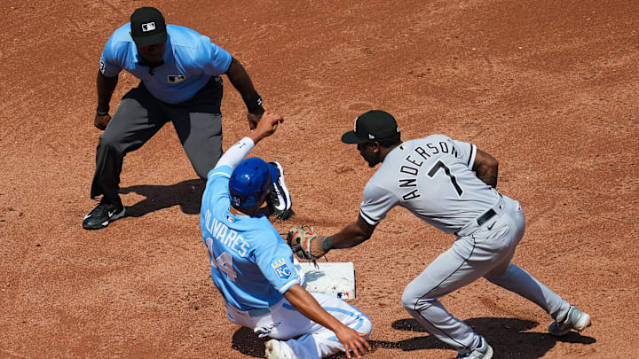 Kansas City Royals left fielder Edward Olivares (14) is caught stealing second base by Chicago White Sox shortstop Tim Anderson (7) during the third inning at Kauffman Stadium in 2023.