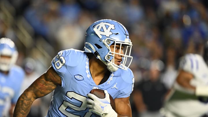 Nov 11, 2023; Chapel Hill, North Carolina, USA; North Carolina Tar Heels running back Omarion Hampton (28) with the ball in the first quarter at Kenan Memorial Stadium. Mandatory Credit: Bob Donnan-Imagn Images Nov 11, 2023; Chapel Hill, North Carolina, USA; North Carolina Tar Heels running back Omarion Hampton (28) with the ball in the first quarter at Kenan Memorial Stadium. Mandatory Credit: Bob Donnan-Imagn Images