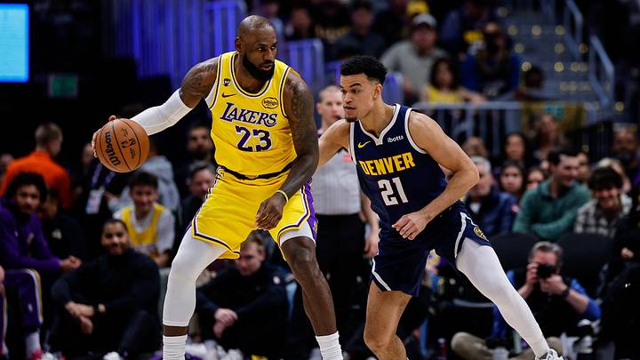 Jan 20, 2026; Denver, Colorado, USA; Los Angeles Lakers forward LeBron James (23) controls the ball as Denver Nuggets forward Spencer Jones (21) guards in the second quarter at Ball Arena. Mandatory Credit: Isaiah J. Downing-Imagn Images Jan 20, 2026; Denver, Colorado, USA; Los Angeles Lakers forward LeBron James (23) controls the ball as Denver Nuggets forward Spencer Jones (21) guards in the second quarter at Ball Arena. Mandatory Credit: Isaiah J. Downing-Imagn Images