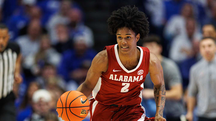 Jan 18, 2025; Lexington, Kentucky, USA; Alabama Crimson Tide guard Aden Holloway (2) brings the ball up court during the first half against the Kentucky Wildcats at Rupp Arena at Central Bank Center. Mandatory Credit: Jordan Prather-Imagn Images