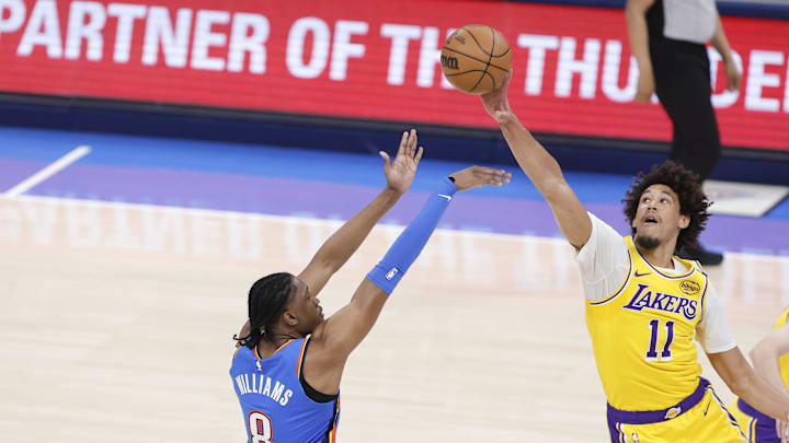 Apr 8, 2025; Oklahoma City, Oklahoma, USA; Oklahoma City Thunder forward Jalen Williams (8) has a shot blocked by Los Angeles Lakers center Jaxson Hayes (11) during the first quarter at Paycom Center. Mandatory Credit: Alonzo Adams-Imagn Images