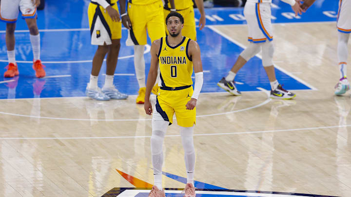 Jun 16, 2025; Oklahoma City, Oklahoma, USA; Indiana Pacers guard Tyrese Haliburton (0) walks back to the team bench in the first quarter against the Oklahoma City Thunder during game five of the 2025 NBA Finals at Paycom Center. Mandatory Credit: Alonzo Adams-Imagn Images