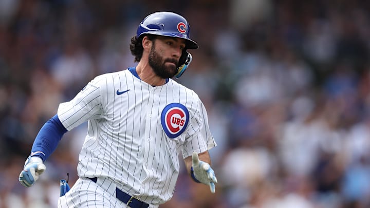 Chicago Cubs shortstop Dansby Swanson (7) runs to first base during the fifth inning against the Pittsburgh Pirates at Wrigley Field. Chicago Cubs shortstop Dansby Swanson (7) runs to first base during the fifth inning against the Pittsburgh Pirates at Wrigley Field.