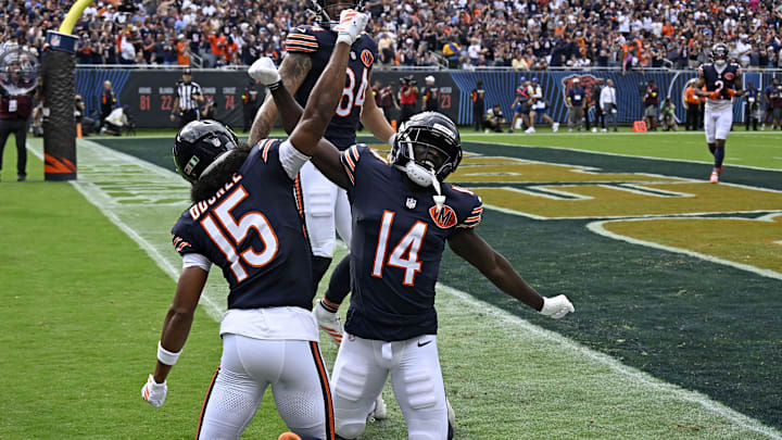 Bears receiver Rome Odunze (15) reacts after a touchdown catch with Olamide Zaccheaus (14) against the Cowboys