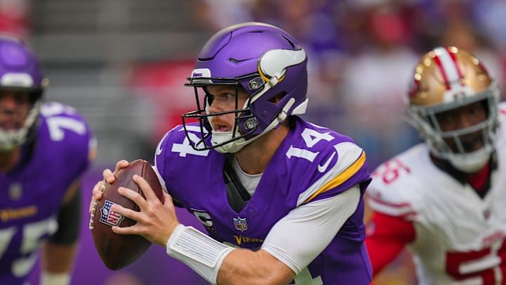 Sep 15, 2024; Minneapolis, Minnesota, USA; Minnesota Vikings quarterback Sam Darnold (14) scrambles against the San Francisco 49ers in the first quarter at U.S. Bank Stadium. Mandatory Credit: Brad Rempel-Imagn Images Sep 15, 2024; Minneapolis, Minnesota, USA; Minnesota Vikings quarterback Sam Darnold (14) scrambles against the San Francisco 49ers in the first quarter at U.S. Bank Stadium. Mandatory Credit: Brad Rempel-Imagn Images
