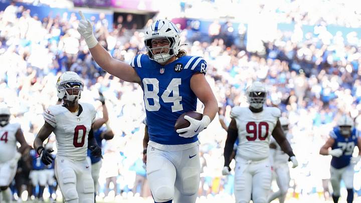 Indianapolis Colts tight end Tyler Warren (84) scores a touchdown during a game against the Arizona Cardinals at Lucas Oil Stadium. Indianapolis Colts tight end Tyler Warren (84) scores a touchdown during a game against the Arizona Cardinals at Lucas Oil Stadium.