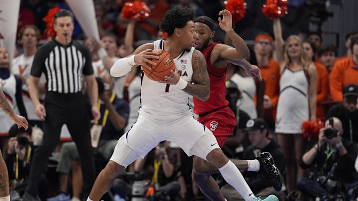 Mar 12, 2026; Charlotte, NC, USA; Virginia Cavaliers guard Malik Thomas (1) handles the ball against the NC State Wolfpack during the second half at Spectrum Center. Mandatory Credit: Jim Dedmon-Imagn Images