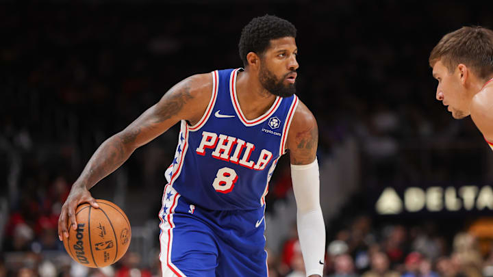 Oct 14, 2024; Atlanta, Georgia, USA; Philadelphia 76ers forward Paul George (8) dribbles against the Atlanta Hawks in the second quarter at State Farm Arena. Mandatory Credit: Brett Davis-Imagn Images