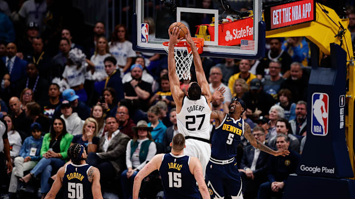 Apr 19, 2023; Denver, Colorado, USA; Minnesota Timberwolves center Rudy Gobert (27) dunks the ball