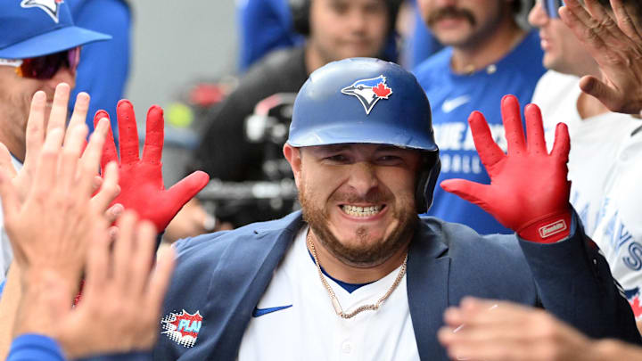 Jun 19, 2025; Toronto, Ontario, CAN;  Toronto Blue Jays catcher Alejandro Kirk (30) celebrates with teammates in the dugout after hitting a solo home run against the Arizona Diamondbacks in the second inning at Rogers Centre. Mandatory Credit: Dan Hamilton-Imagn Images