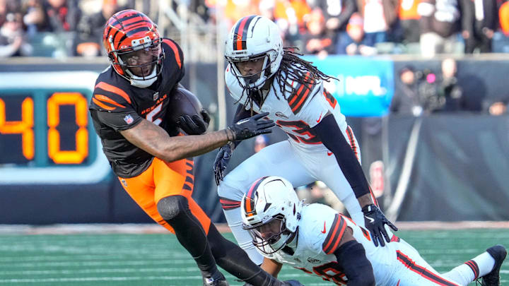 Cincinnati Bengals wide receiver Tee Higgins (5) catches a pass in the second quarter of the NFL Week 16 game between the Cincinnati Bengals and the Cleveland Browns at Paycor Stadium in downtown Cincinnati on Sunday, Dec. 22, 2024. The Bengals led 17-0 at halftime. Cincinnati Bengals wide receiver Tee Higgins (5) catches a pass in the second quarter of the NFL Week 16 game between the Cincinnati Bengals and the Cleveland Browns at Paycor Stadium in downtown Cincinnati on Sunday, Dec. 22, 2024. The Bengals led 17-0 at halftime.