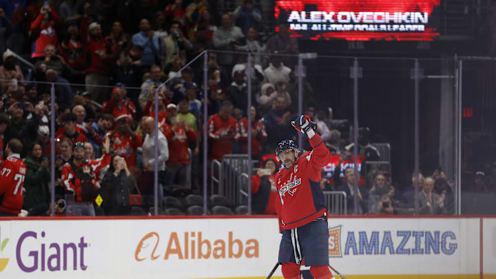 Nov 5, 2025; Washington, District of Columbia, USA; Washington Capitals left wing Alex Ovechkin (8) waves to the crowd after scoring his 900th NHL goal, against the St. Louis Blues, during the second period at Capital One Arena. Mandatory Credit: Geoff Burke-Imagn Images