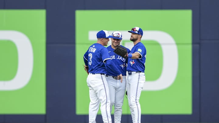 Toronto Blue Jays outfielder Myles Straw, Daulton Varsho and Nathan Lukes celebrate. Toronto Blue Jays outfielder Myles Straw, Daulton Varsho and Nathan Lukes celebrate.
