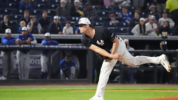 Feb 28, 2025; Tampa, Florida, USA; New York Yankees pitcher Gerrit Cole (45) throws a pitch against the Toronto Blue Jays during the first inning at George M. Steinbrenner Field. Mandatory Credit: Dave Nelson-Imagn Images