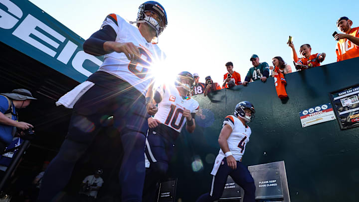 Oct 5, 2025; Philadelphia, Pennsylvania, USA; Denver Broncos quarterbacks Bo Nix (10) and Jarrett Stidham (8) and Sam Ehlinger (4) run from the tunnel for action against the Philadelphia Eagles at Lincoln Financial Field. Mandatory Credit: Bill Streicher-Imagn Images Oct 5, 2025; Philadelphia, Pennsylvania, USA; Denver Broncos quarterbacks Bo Nix (10) and Jarrett Stidham (8) and Sam Ehlinger (4) run from the tunnel for action against the Philadelphia Eagles at Lincoln Financial Field. Mandatory Credit: Bill Streicher-Imagn Images