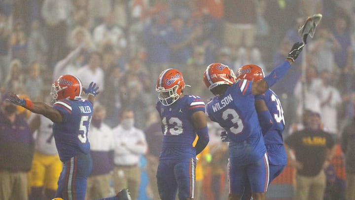 Dec 12, 2020; Gainesville, FL, USA; After a tackle Florida Gators defensive back Marco Wilson (3) throws the shoe of LSU tight end Kole Taylor (87) which resulted in a personal foul penalty against Wilson, during a game against the LSU Tigers at Ben Hill Griffin Stadium in Gainesville, Fla. Dec. 12, 2020. Florida lost 37-34 to the Tigers. Mandatory Credit: Brad McClenny-USA TODAY NETWORK 