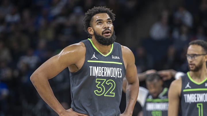 Nov 20, 2023; Minneapolis, Minnesota, USA; Minnesota Timberwolves center Karl-Anthony Towns (32) looks on against the New York Knicks in the first half at Target Center. Mandatory Credit: Jesse Johnson-Imagn Images