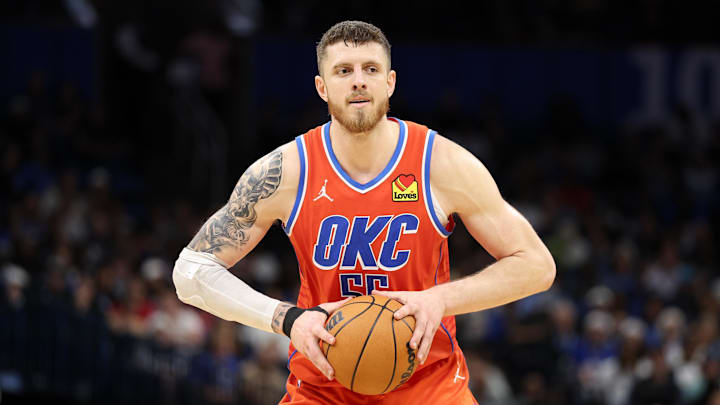 Dec 19, 2024; Orlando, Florida, USA; Oklahoma City Thunder center Isaiah Hartenstein (55) looks to pass the ball against the Orlando Magic in the fourth quarter at Kia Center. Mandatory Credit: Nathan Ray Seebeck-Imagn Images Dec 19, 2024; Orlando, Florida, USA; Oklahoma City Thunder center Isaiah Hartenstein (55) looks to pass the ball against the Orlando Magic in the fourth quarter at Kia Center. Mandatory Credit: Nathan Ray Seebeck-Imagn Images