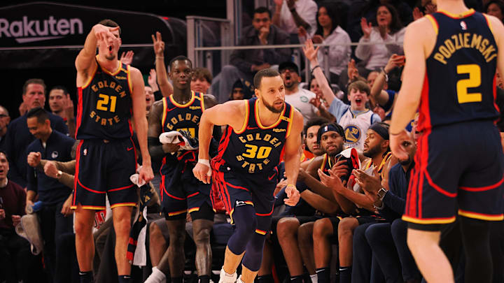 Jan 23, 2025; San Francisco, California, USA; Golden State Warriors guard Stephen Curry (30) ahead of the Warriors bench after scoring a three point basket against the Chicago Bulls during the fourth quarter at Chase Center. Mandatory Credit: Kelley L Cox-Imagn Images