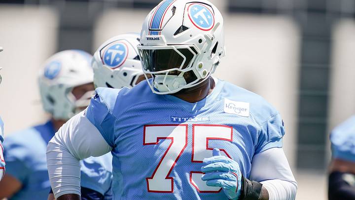 Tennessee Titans tackle Dan Moore Jr. (75) heads to the field during mandatory minicamp at Vanderbilt Health Football Center in Nashville, Tenn., Wednesday, June 17, 2026. Tennessee Titans tackle Dan Moore Jr. (75) heads to the field during mandatory minicamp at Vanderbilt Health Football Center in Nashville, Tenn., Wednesday, June 17, 2026.