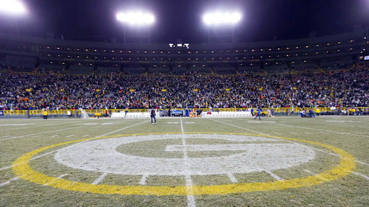 Nov 30, 2014; Green Bay, WI, USA; The Green Bay Packers logo at midfield of Lambeau Field following the game between the New England Patriots and Green Bay Packers.  Green Bay won 26-21.  Mandatory Credit: Jeff Hanisch-Imagn Images