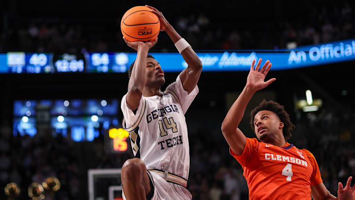 Jan 24, 2026; Atlanta, Georgia, USA; Georgia Tech Yellow Jackets forward Kowacie Reeves Jr. (14) shoots over Clemson Tigers guard Butta Johnson (4) in the second half at McCamish Pavilion. Mandatory Credit: Brett Davis-Imagn Images
