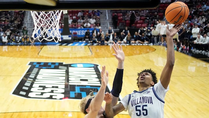 Mar 20, 2026; San Diego, CA, USA; Villanova Wildcats guard Acaden Lewis (55) shoots against Utah State Aggies forward Karson Templin (22) in the second half during a first round game of the men's 2026 NCAA Tournament at Viejas Arena. Mandatory Credit: Kirby Lee-Imagn Images